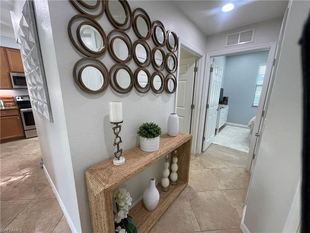 9727 Acqua CT 418, Naples, FL 34113