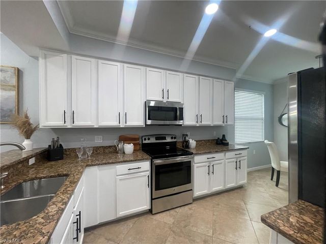 9727 Acqua CT 418, Naples, FL 34113