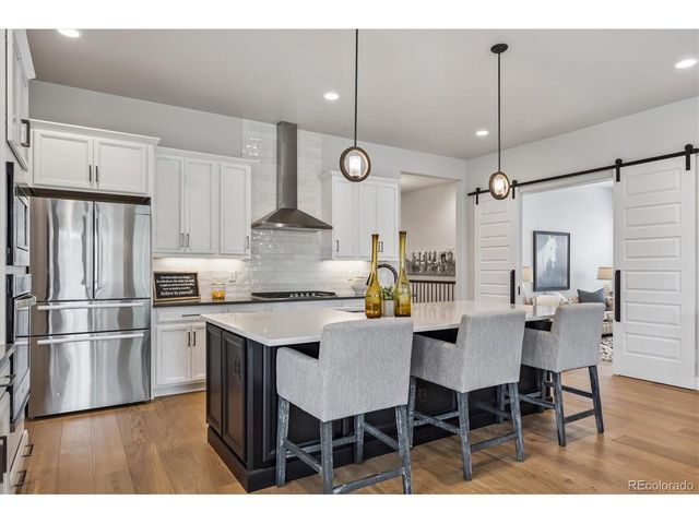 8890 S Quatar Ct, Aurora, CO 80016