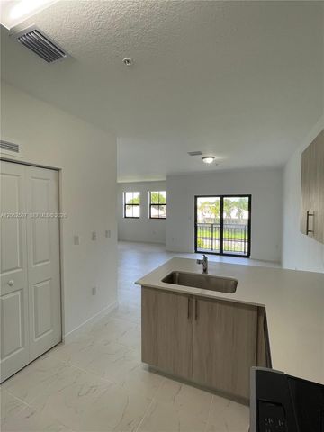 15560 SW 136th Street 207, Miami, FL 33196