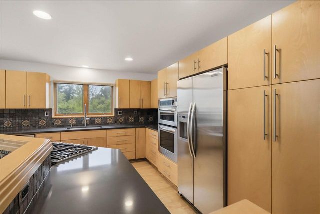 3411 W River DRIVE, Mequon, WI 53097