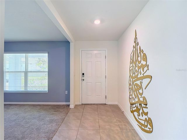 7737 ROSEWOOD GARDEN LOOP, Tampa, FL 33637
