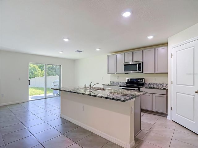 7737 ROSEWOOD GARDEN LOOP, Tampa, FL 33637