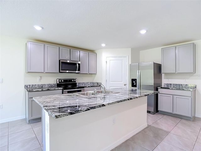 7737 ROSEWOOD GARDEN LOOP, Tampa, FL 33637