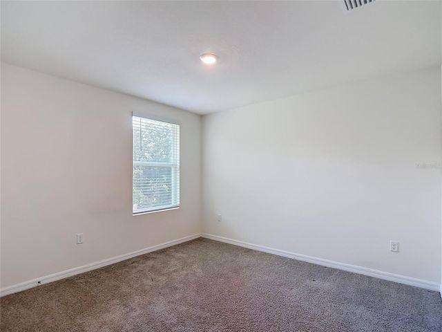 7737 ROSEWOOD GARDEN LOOP, Tampa, FL 33637