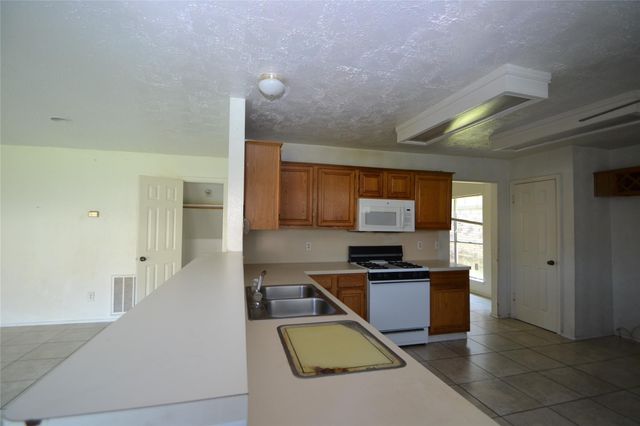 12410 Meadow Briar Drive, Stafford, TX 77477