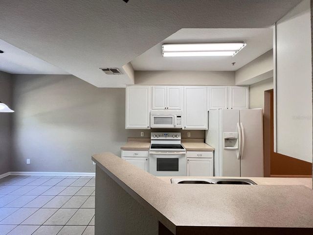 6465 CANTUA LANE 103, Orlando, FL 32835