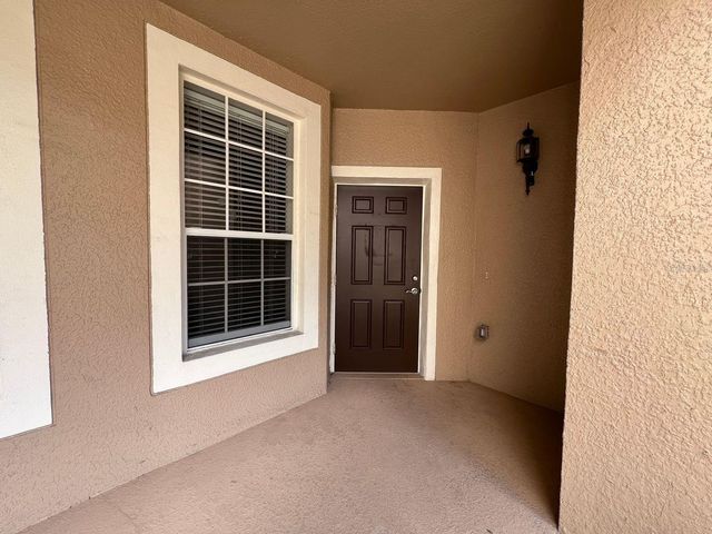 6465 CANTUA LANE 103, Orlando, FL 32835