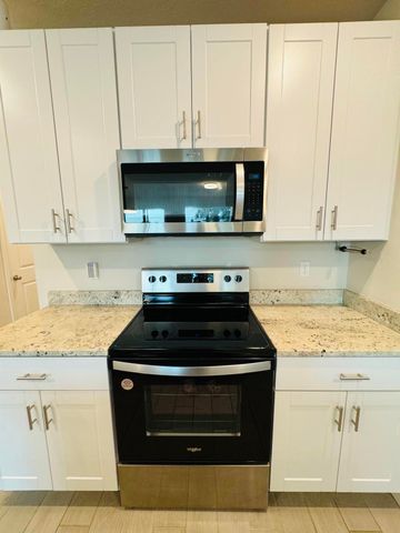 5677 MENTMORE Drive 5677, Mangonia Park, FL 33407