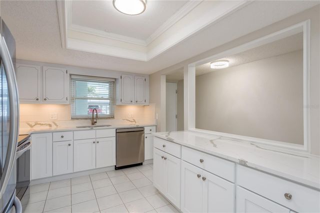 8 GLENCOE PLACE 104, Dunedin, FL 34698