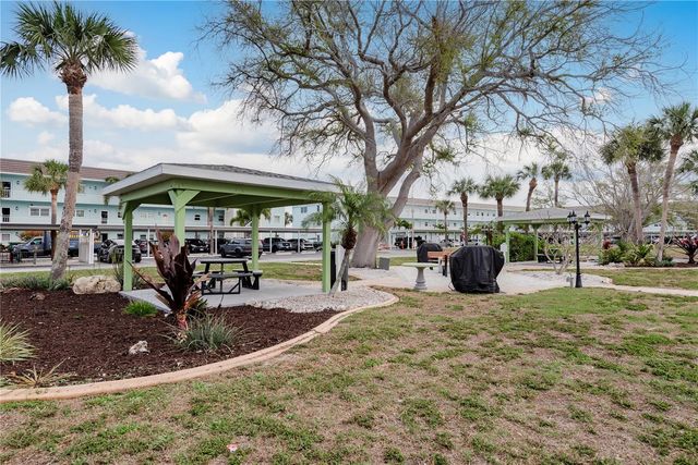 8 GLENCOE PLACE 104, Dunedin, FL 34698