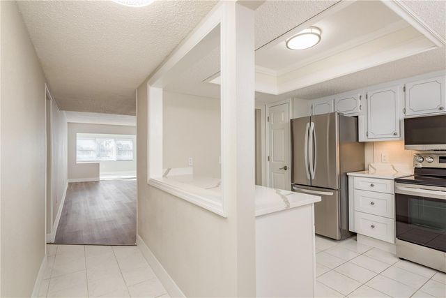 8 GLENCOE PLACE 104, Dunedin, FL 34698