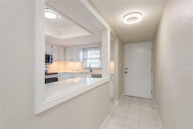8 GLENCOE PLACE 104, Dunedin, FL 34698