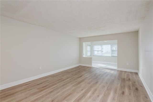 8 GLENCOE PLACE 104, Dunedin, FL 34698