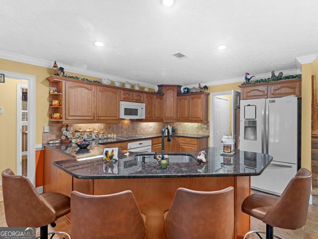 1220 Lake Stone Lea Drive, Oxford, GA 30054