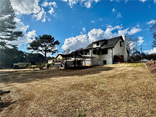 1709 Rangewood SW Drive, Lilburn, GA 30047