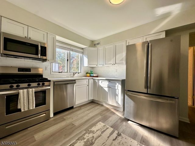 44 Canterbury Ln, New Milford Boro, NJ 07646