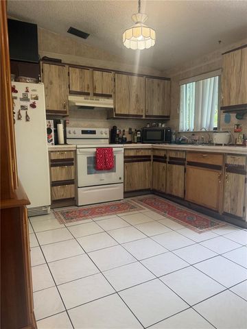 1304 DONWOODS LANE, Royal Palm Beach, FL 33411