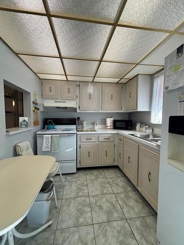 725 Lori Drive 203, Palm Springs, FL 33461