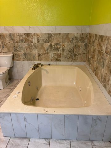 703 W 4Th St, Lonoke, AR 72086