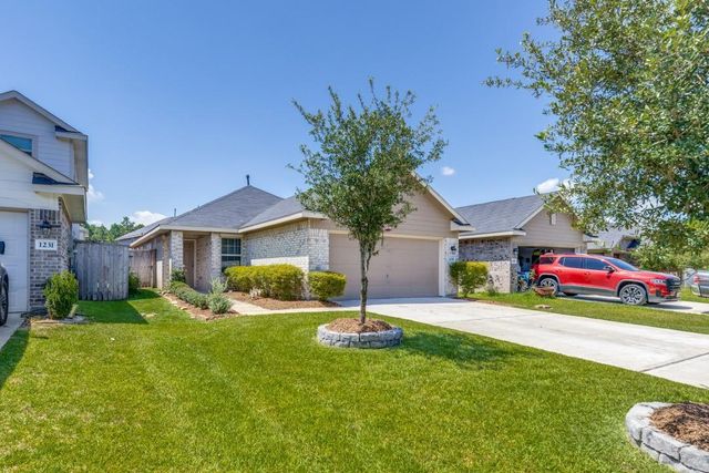 1235 Blue Hazel Court, Pinehurst, TX 77362