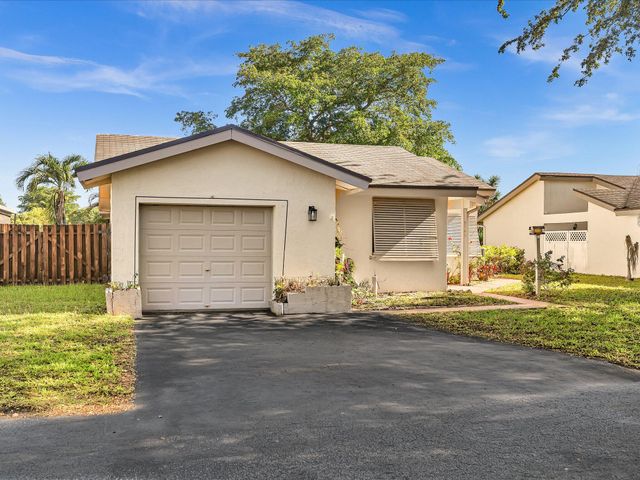 8949 NW 9th Place, Plantation, FL 33324