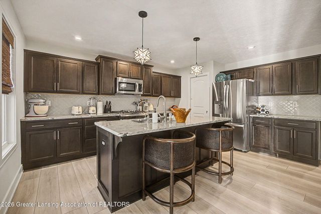 9660 Tobermory Drive, Haslett, MI 48840