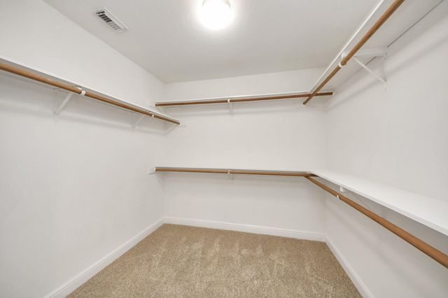 66 Scarlet Woods Court, The Woodlands, TX 77380