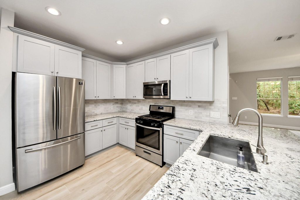 66 Scarlet Woods Court, The Woodlands, TX 77380