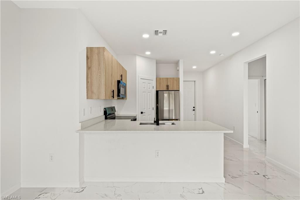 3106 61st ST W, LEHIGH ACRES, FL 33971 — photo 4