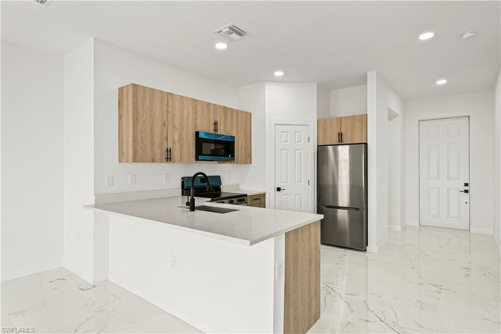 3106 61st ST W, LEHIGH ACRES, FL 33971 — photo 5
