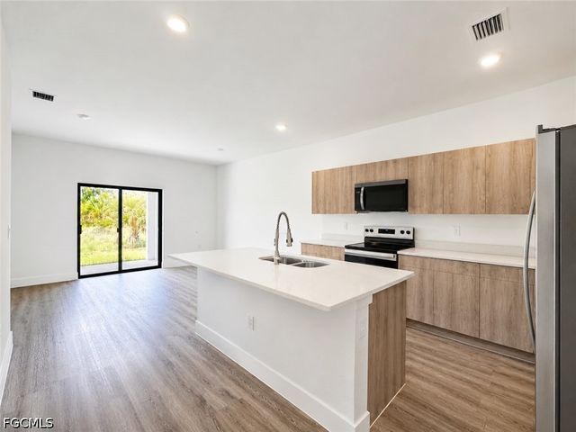 1258 MILWAUKEE BLVD, Lehigh Acres, FL 33974