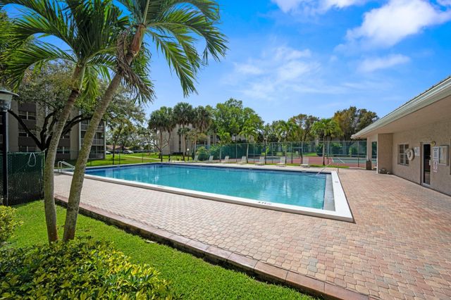 8735 Ramblewood Drive 409, Coral Springs, FL 33071