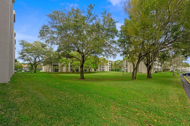 8735 Ramblewood Drive 409, Coral Springs, FL 33071