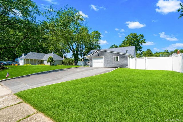 150 Serpentine Lane, Islandia, NY 11749