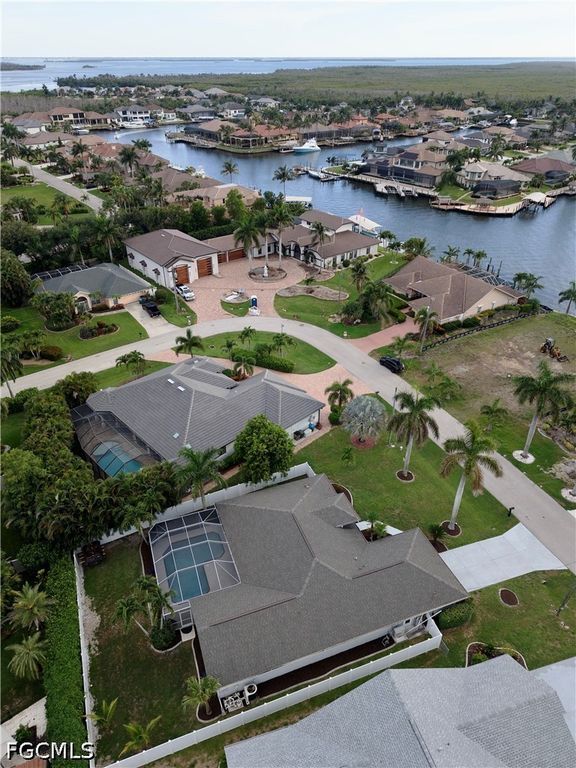 Image 4 of property listing at 1438 SW 57th ST, Cape Coral, FL 33914