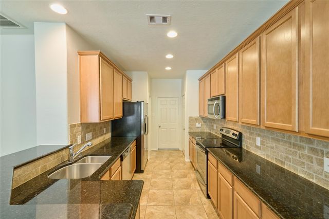 327 Bloomhill Place, Magnolia, TX 77354