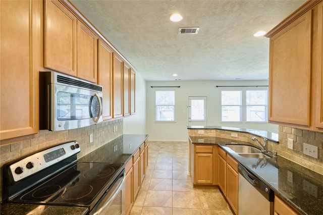 327 Bloomhill Place, Magnolia, TX 77354