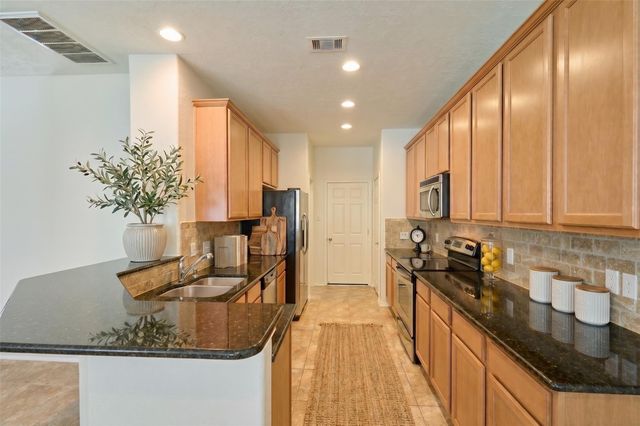 327 Bloomhill Place, Magnolia, TX 77354