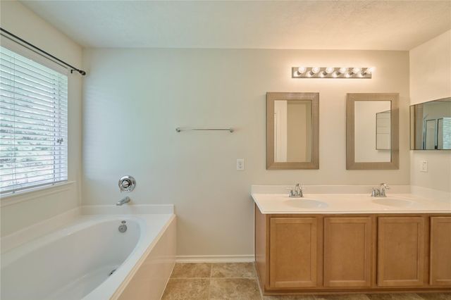 327 Bloomhill Place, Magnolia, TX 77354