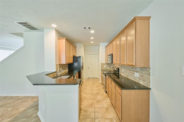 327 Bloomhill Place, Magnolia, TX 77354