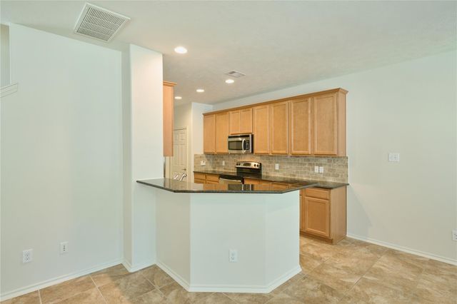 327 Bloomhill Place, Magnolia, TX 77354