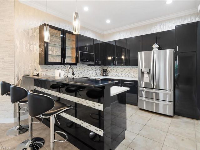 8687 Genova CT, Naples, FL 34114