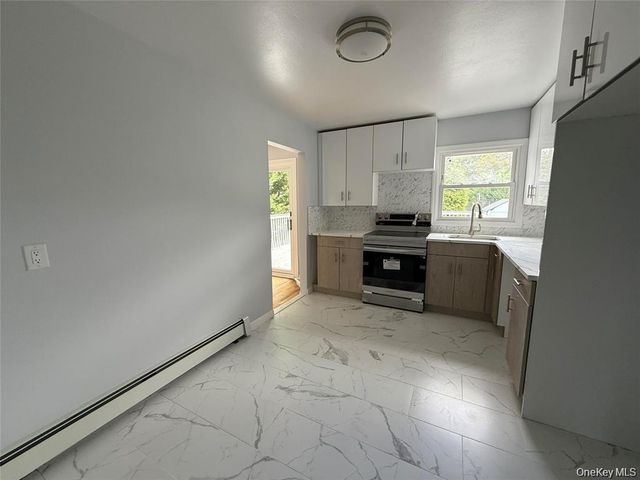 324 Buckingham Road, Cedarhurst, NY 11516