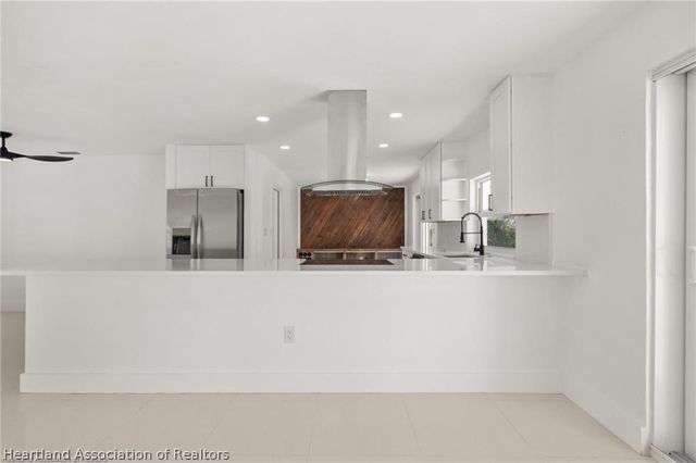 107 Lakefront Lane NW, Lake Placid, FL 33852