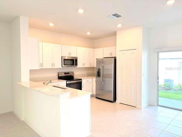 10171 TRUMPET HONEYSUCKLE WAY, San Antonio, FL 33576