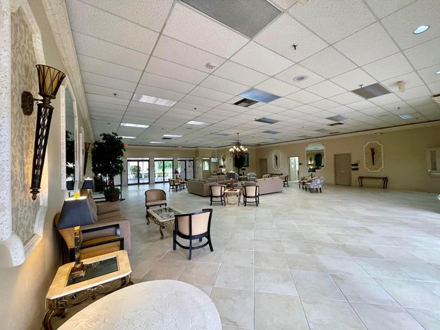 4760 Lucerne Lakes Boulevard W 105, Lake Worth, FL 33467
