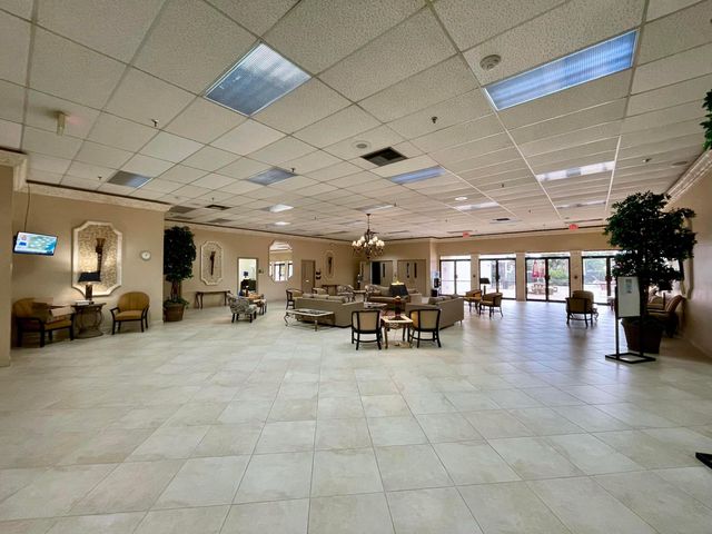 4760 Lucerne Lakes Boulevard W 105, Lake Worth, FL 33467