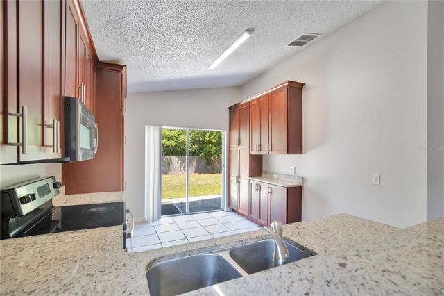 10021 CYPRESS MEADOWS LANE, Orlando, FL 32825