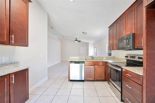 10021 CYPRESS MEADOWS LANE, Orlando, FL 32825